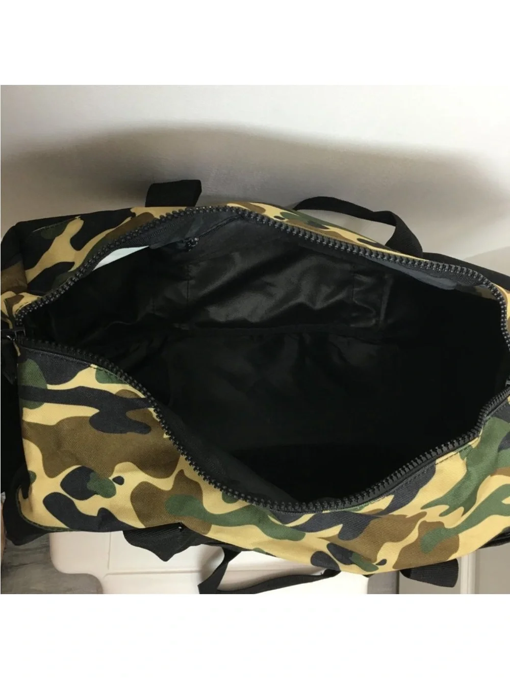 Champion Black Duffel with Green Camo Top
